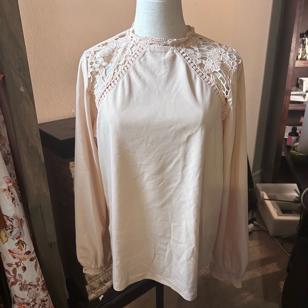 New no tag cream pink shirt. Needs to be pressed.